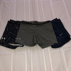 3 pairs of under armor and nike spandex